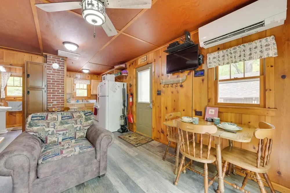 Cozy Carp Lake Cottage w/ Dock, Kayaks & Fire Pit