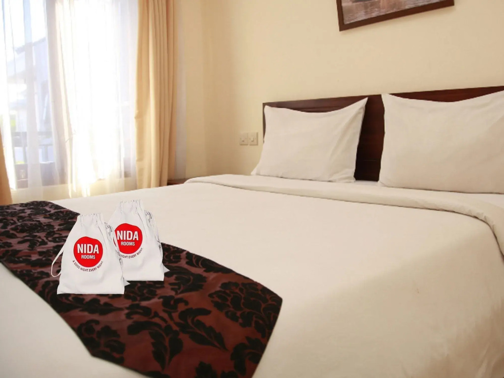 Nida Rooms Dewi Sartika 30 Tuban Kuta at Surya Inn