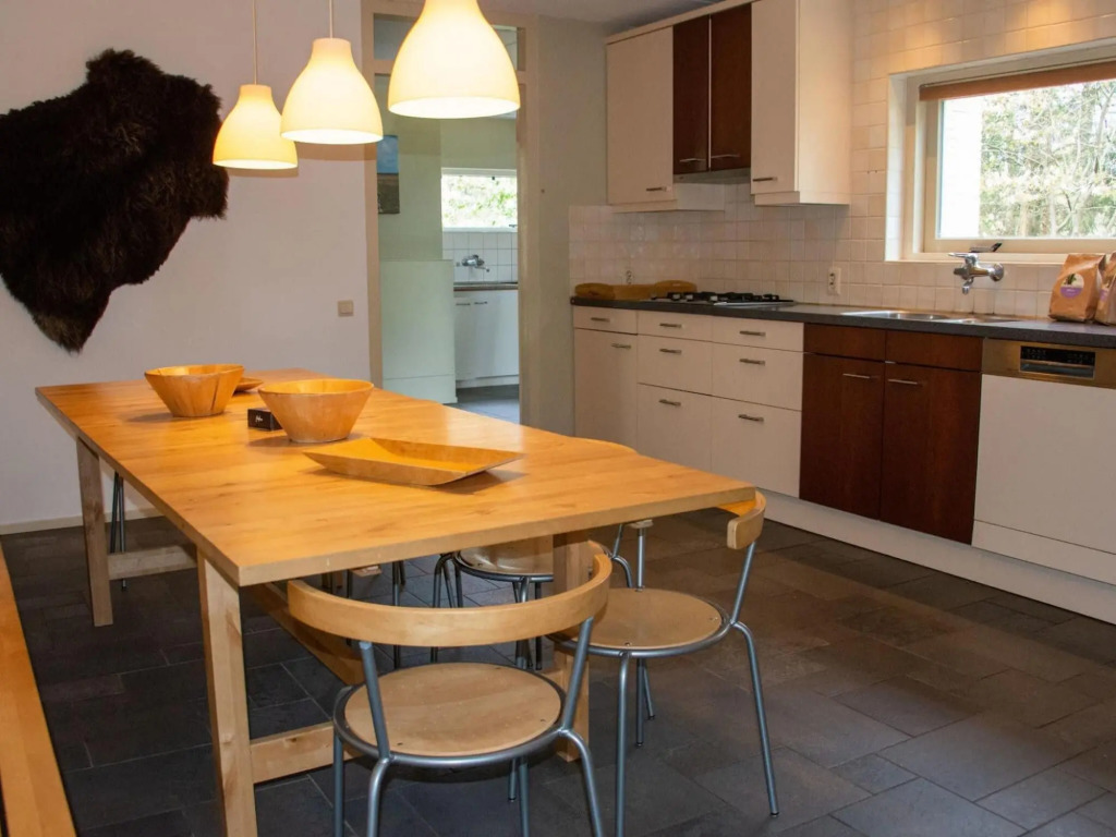 Spacious villa with sauna and hot tub, in a holiday park near a National Park