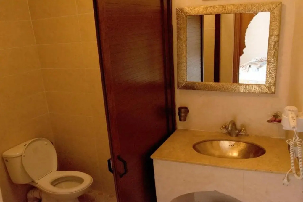 Riad Jenan Adam