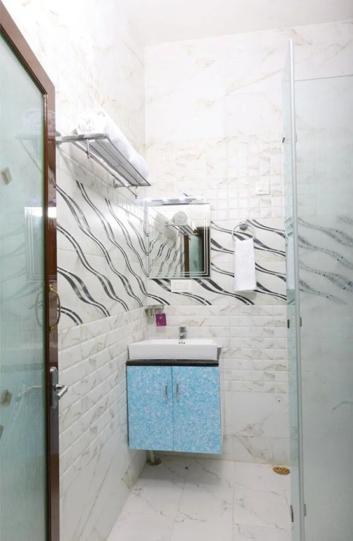 OYO 10701 Moukthi Apartment