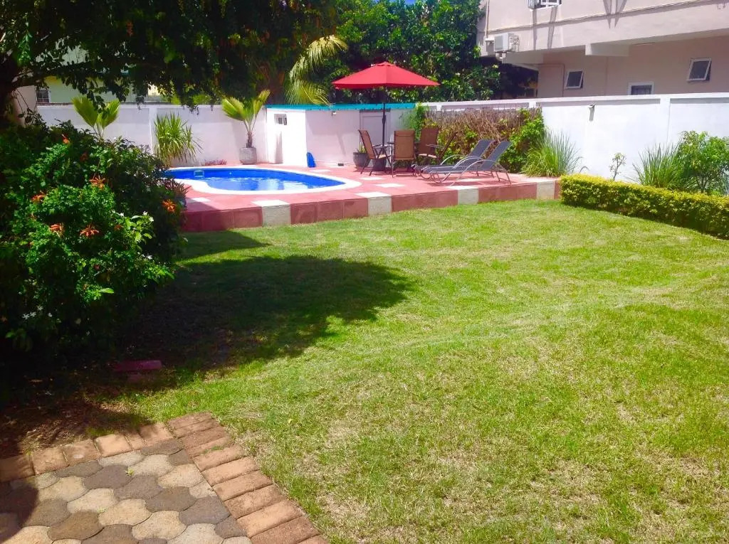 Fayruz Villa is a 3 bedroom, 3 bathroom detached house with AC and swimming pool 5 minutes walk from Flic en Flac public beach