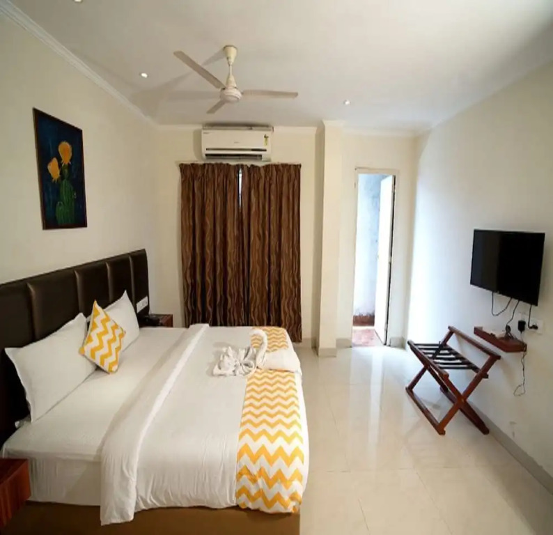 Blossoms Hotel & Service Apartments