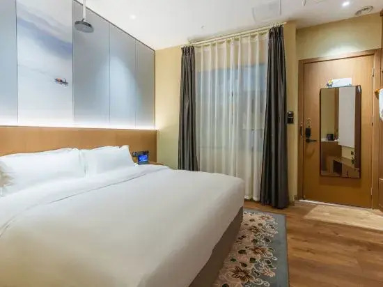 New Bingkai International Hotel (Wetland Park Yellowstone North Station)