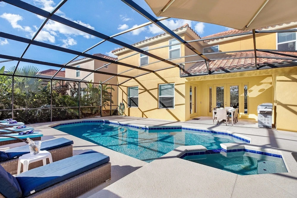 Spacious 6-Bedroom Getaway with Game Room, Private Spa & Sunny Pool Deck in Premier Resort Setting