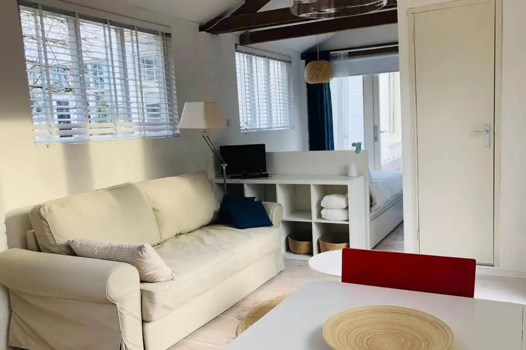 Tiny house in tuin van de statige villa Mariahof