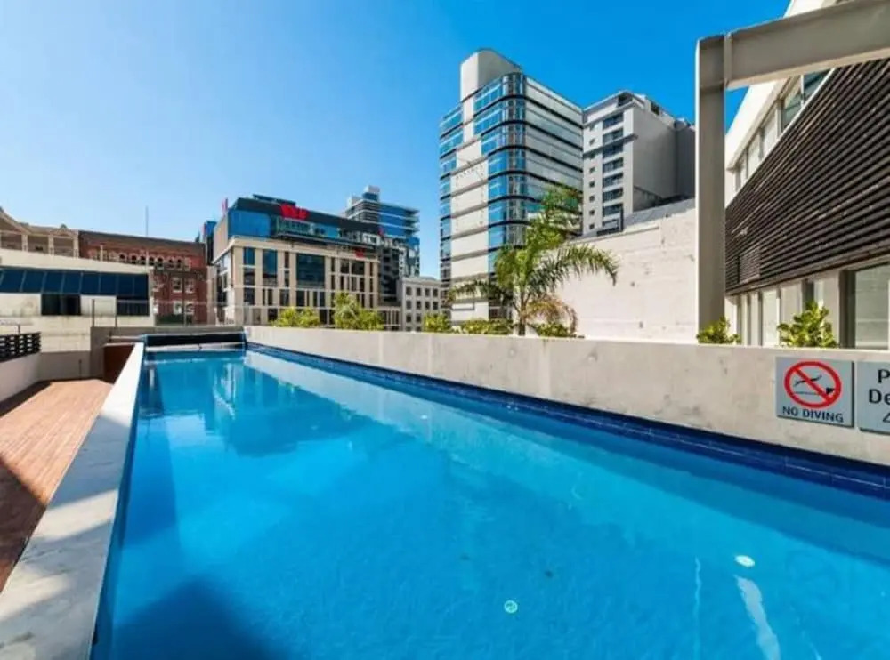 Luxury 2BR Apt– Pool, Gym, Prime Spot Zodiak Stays