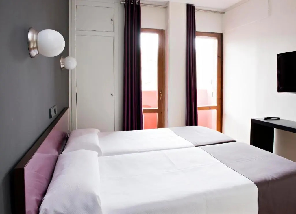 Hospedium Hostal Un Punto Chic