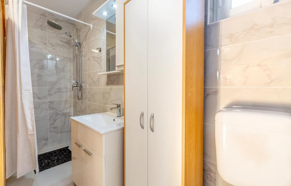 Nice Home in Smiljan With Sauna, Wifi and Outdoor Swimming Pool