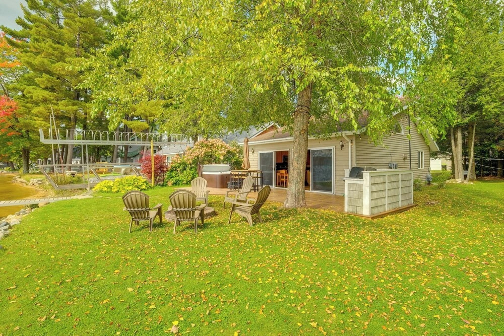 Kalkaska Retreat: Private Hot Tub, Dock, Fireplace