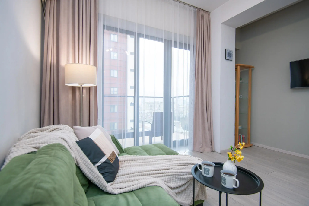 Apartments with a View of the Ferris Wheel and the City