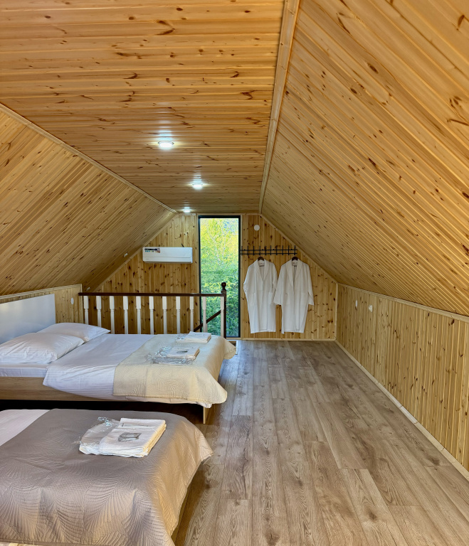 Курортный отель Akhan Resort Gagra - Виллы у реки с видом на горы возле моря