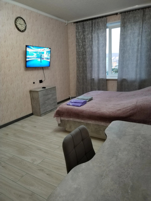 Квартира Уютная квартира с балконом