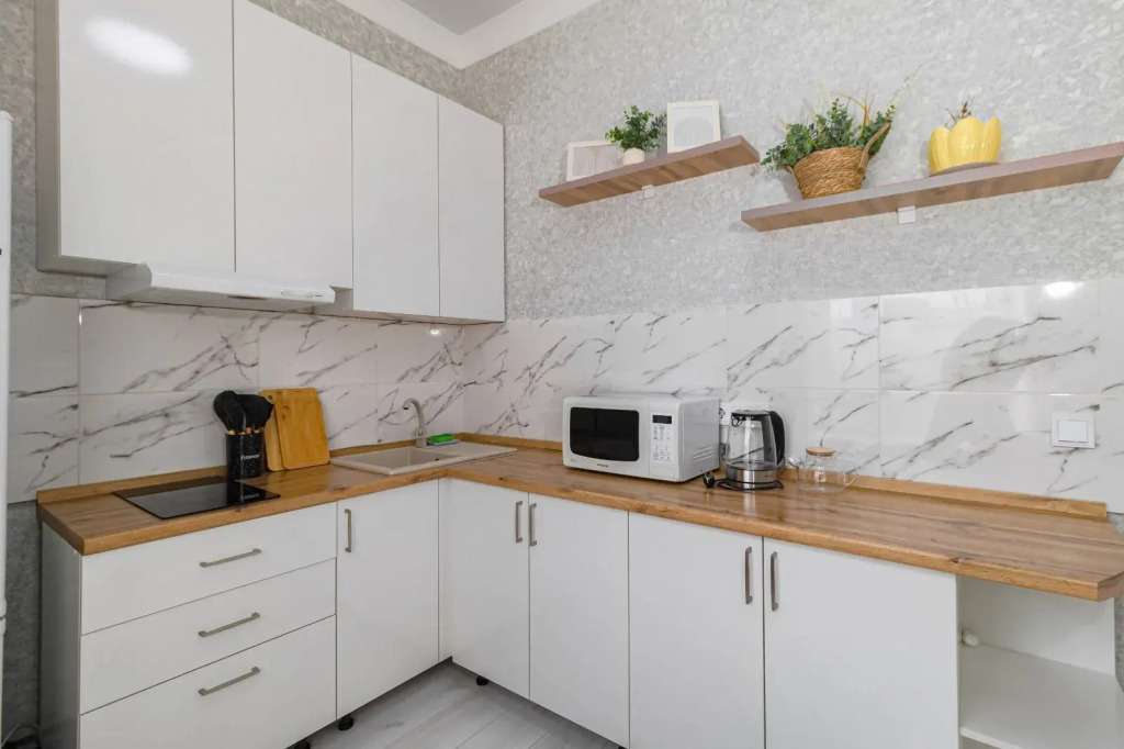 Апартаменты Cozy City Retreat near Arena & Botanical Garden