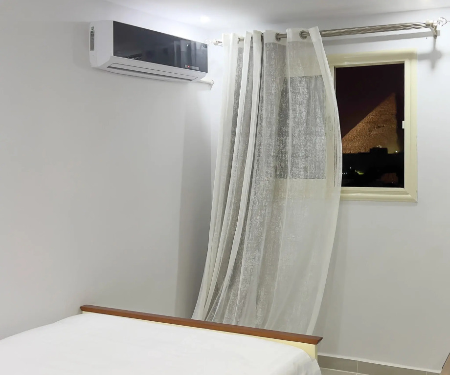 Отель Pyramids Tour View Inn
