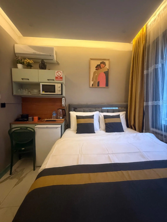 Апартаменты Warm cozy studio near the metro station