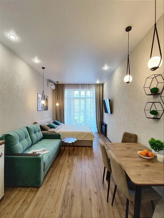 Квартира студия с панорамными окнами