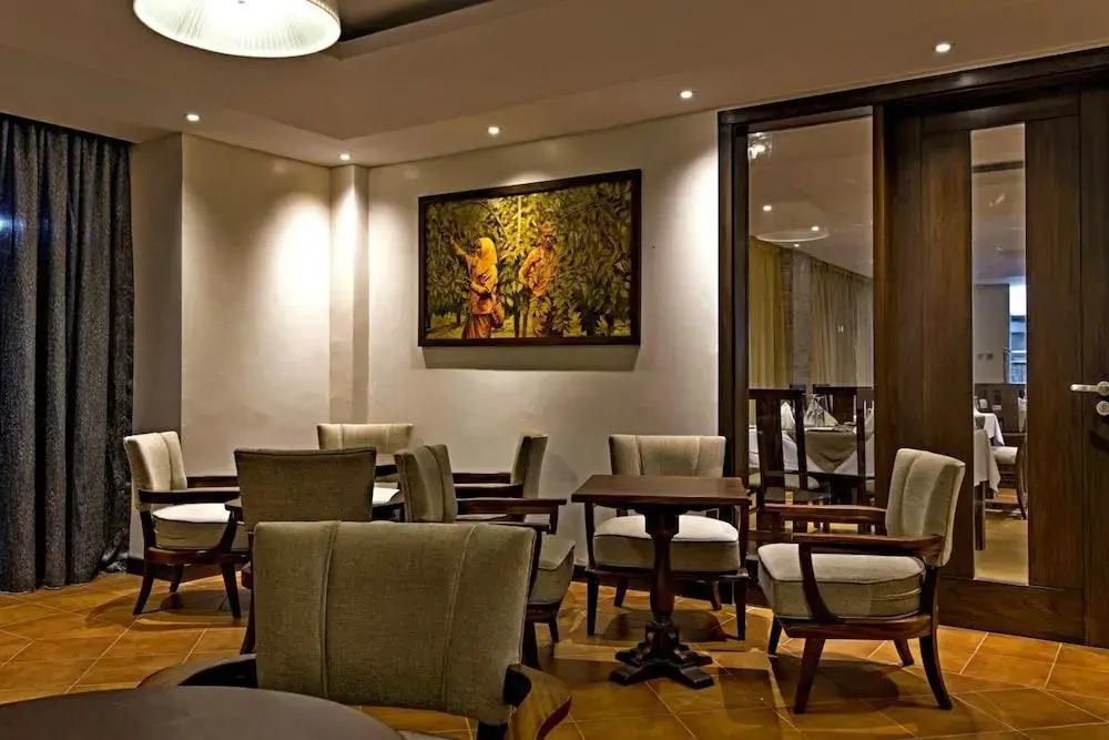 Magna Hotel and Suites