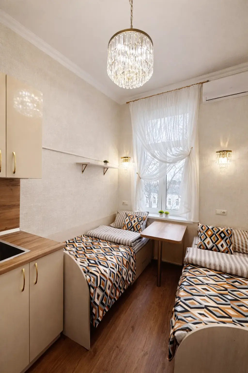 Апартаменты Студия в доме коммунального типа
