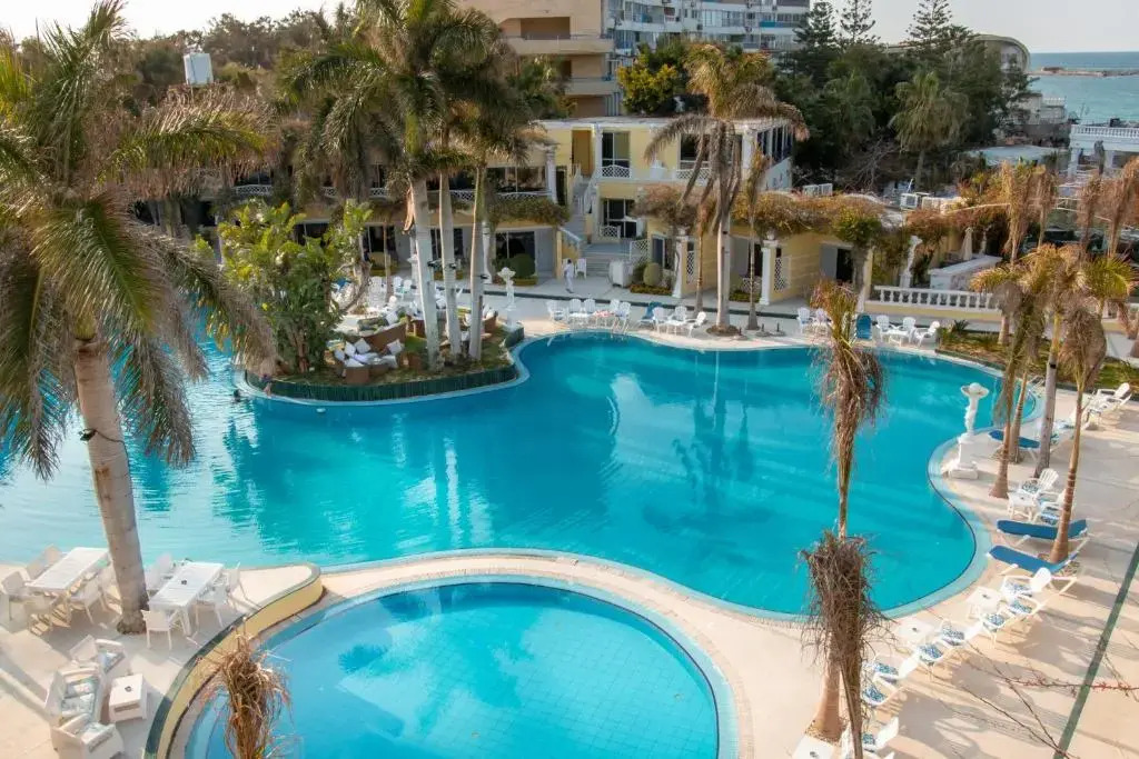 Курортный Отель Paradise Inn Beach Resort Maamoura