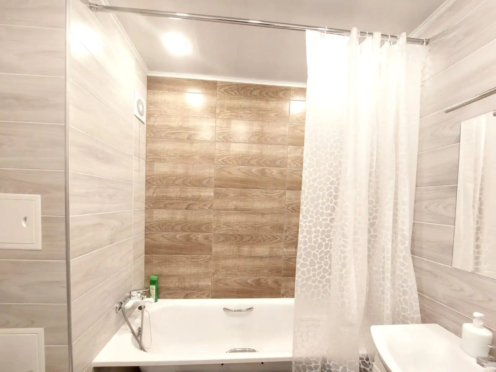 Апартаменты Sharman Apartments в Новом городе у парка