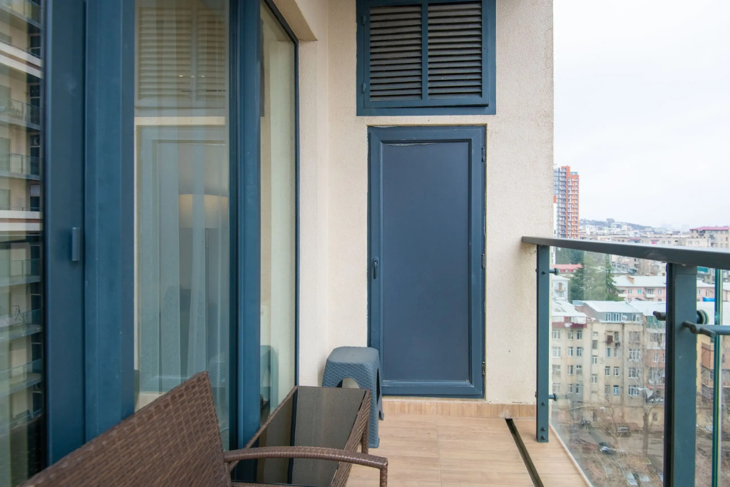 Apartments with a View of the Ferris Wheel and the City
