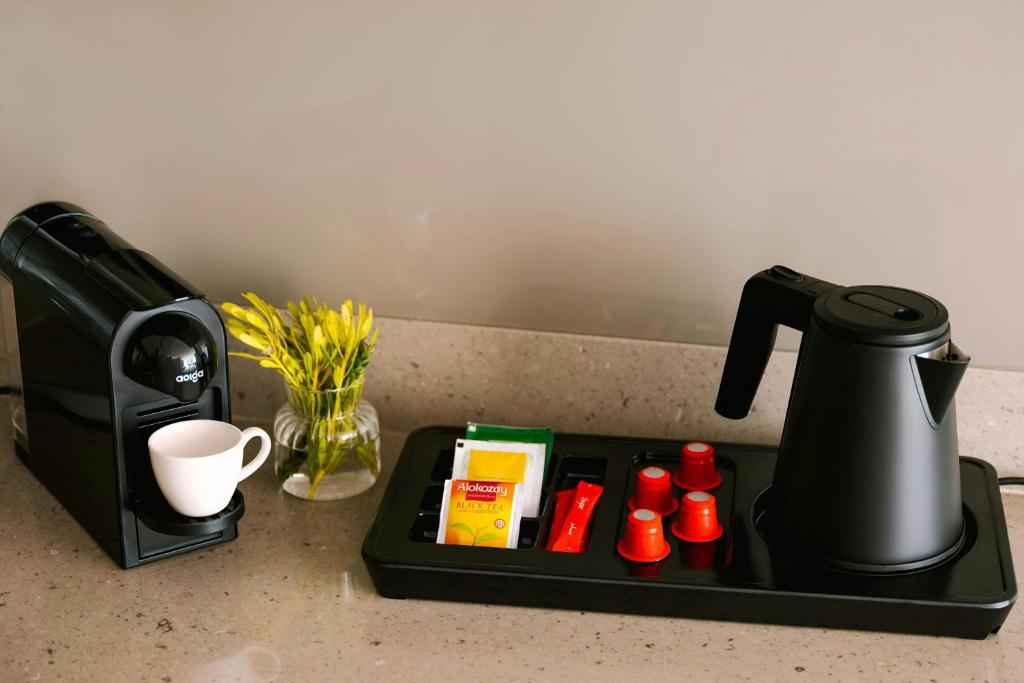 Отель Aura Suites Downtown
