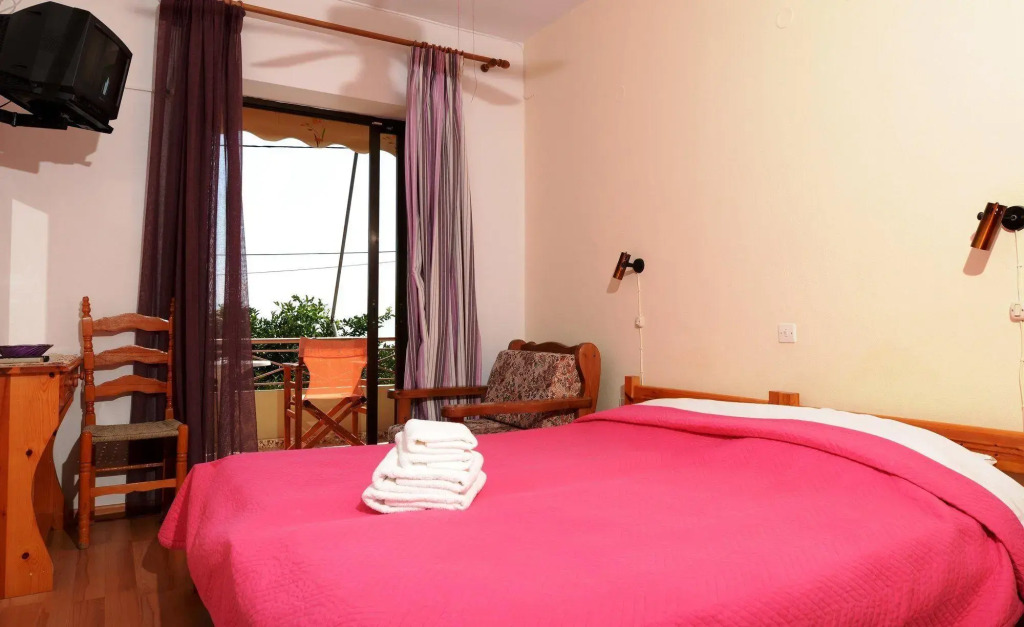 Отель Pharos Rooms