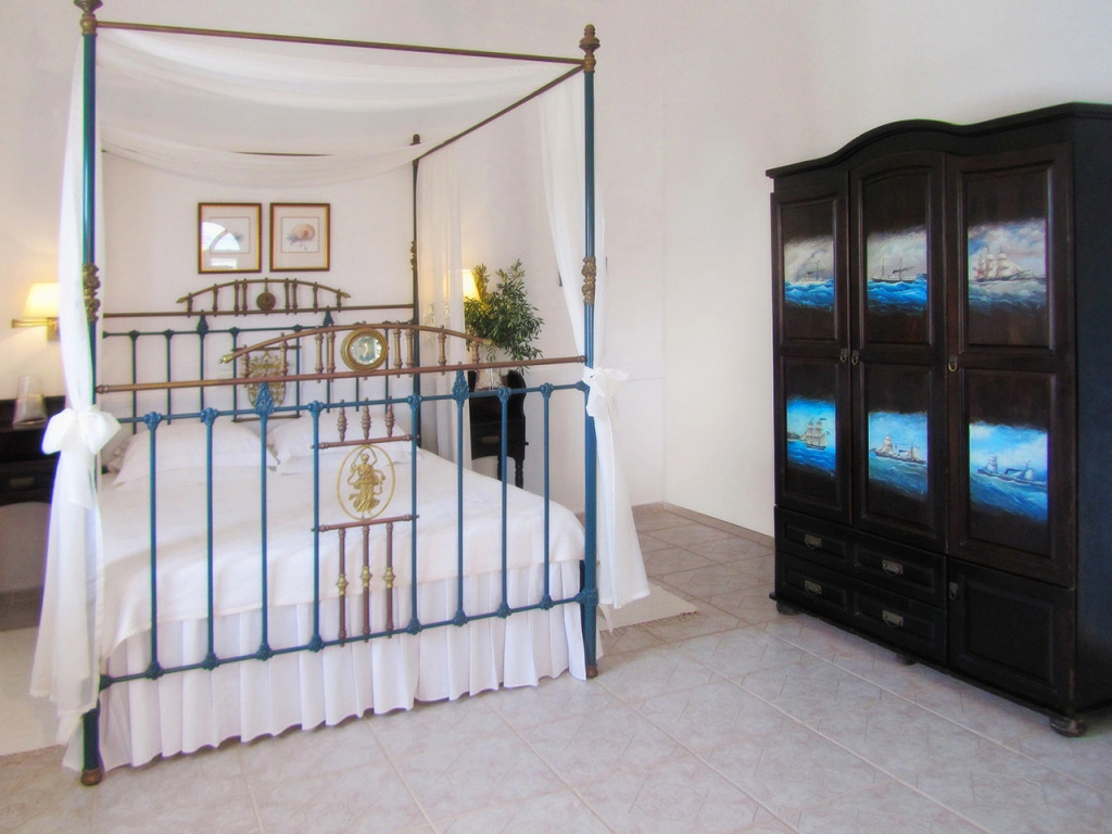 Отель Porto Scoutari Romantic Hotel & Suites