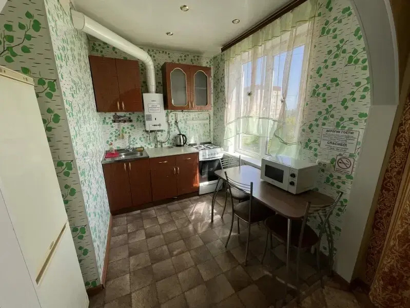 Квартира Лаконичная студия с балконом