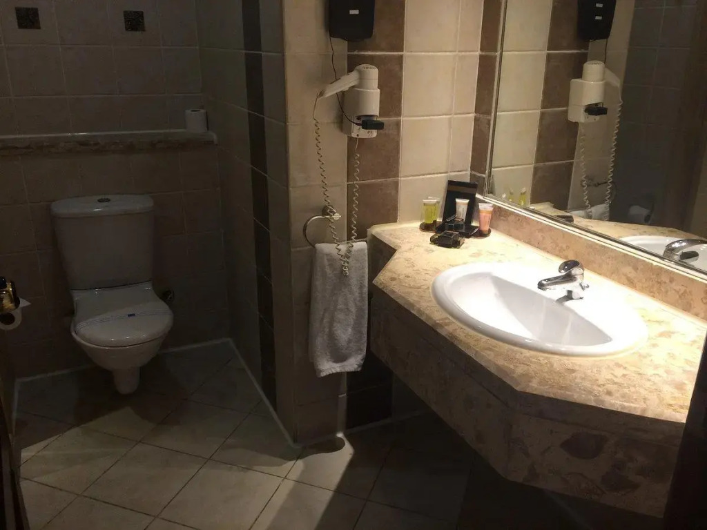 Курортный отель Swiss Inn Pyramids Golf Resort