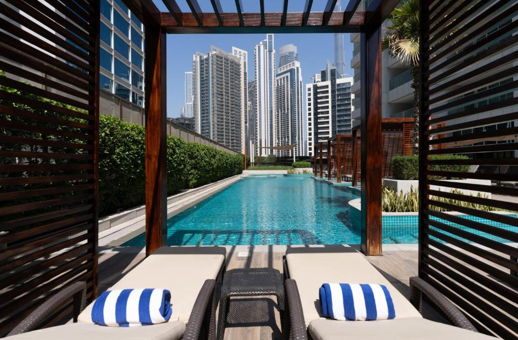 Отель Aura Suites Downtown