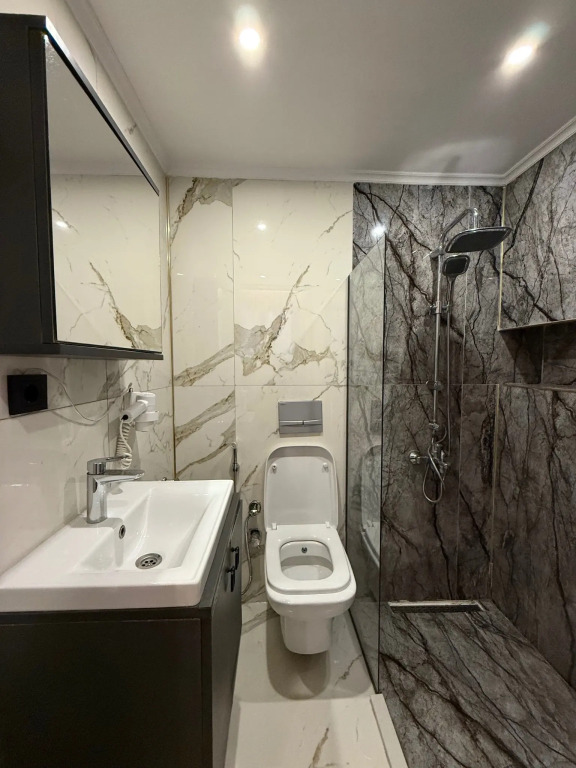 Апартаменты Warm cozy studio near the metro station