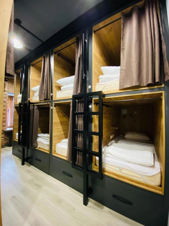 Капсульный отель Сигале