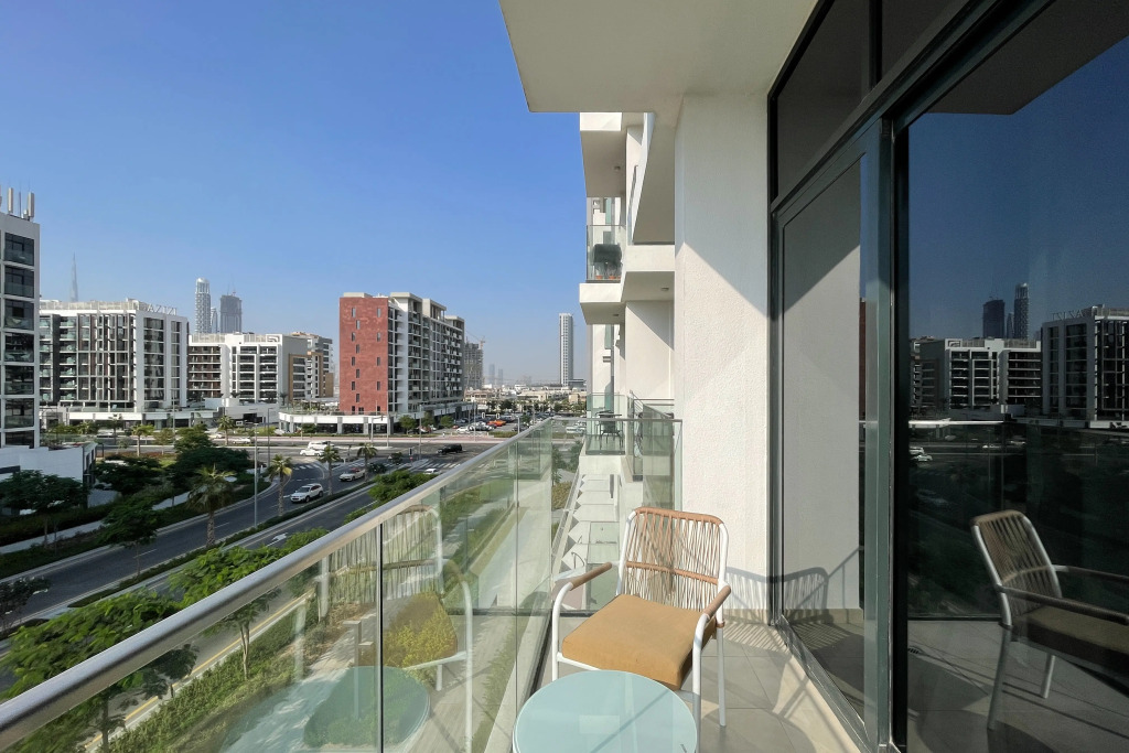 Апартаменты Bright and cozy studio with balcony in Azizi Riviera 33