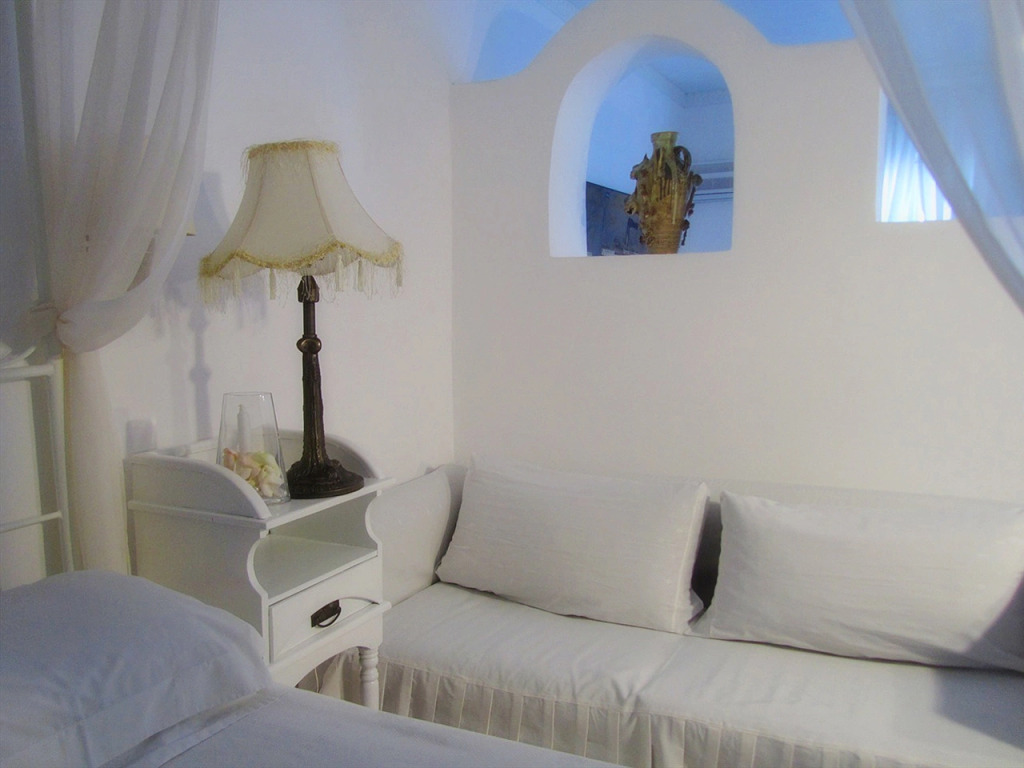 Отель Porto Scoutari Romantic Hotel & Suites