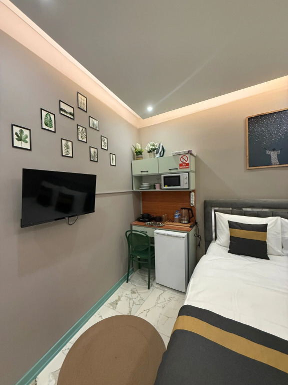 Апартаменты Cozy warm studio near the subway