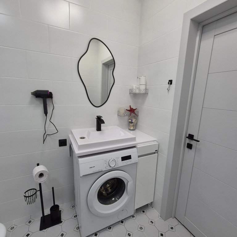 V Novom Dome Flat