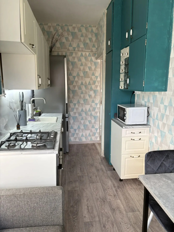 Квартира с подвесным креслом и видом на залив
