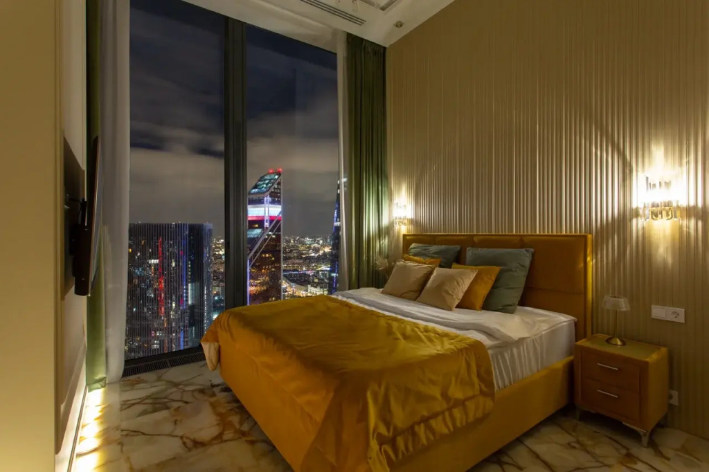 Апартаменты Sky City Moscow пентхаус-формат на 64 этаже: оникс, подсветка, панорамные окна Уникальный вид на башни и город
