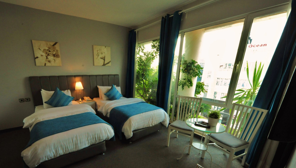 Отель The Conroy Boutique Hotel
