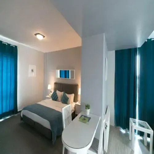 Отель The Conroy Boutique Hotel