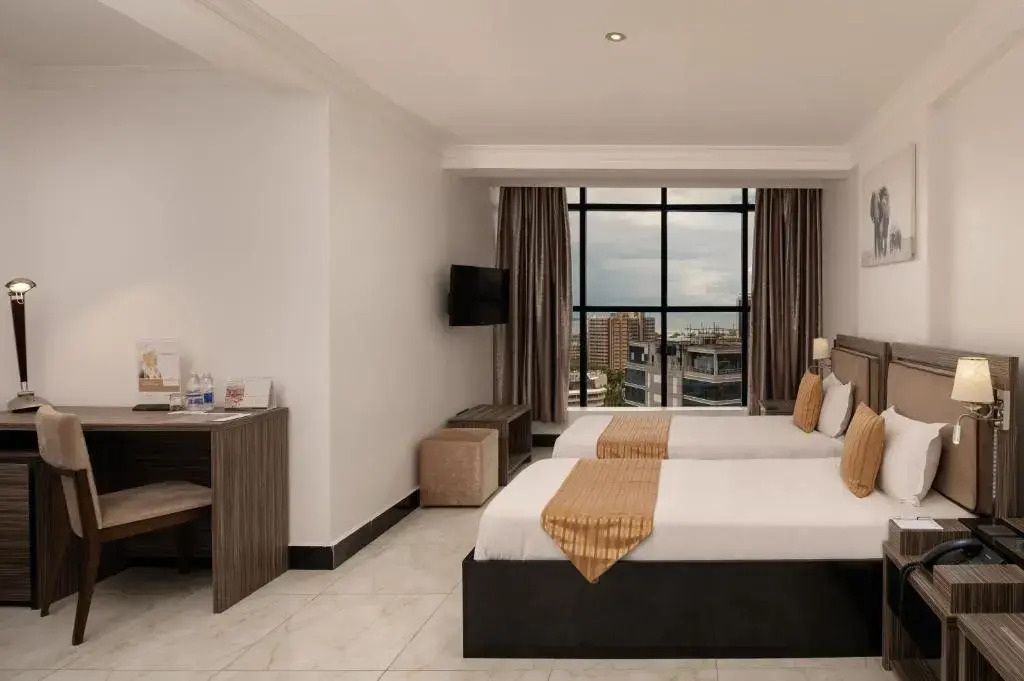 Отель Golden Tulip Dar City Center