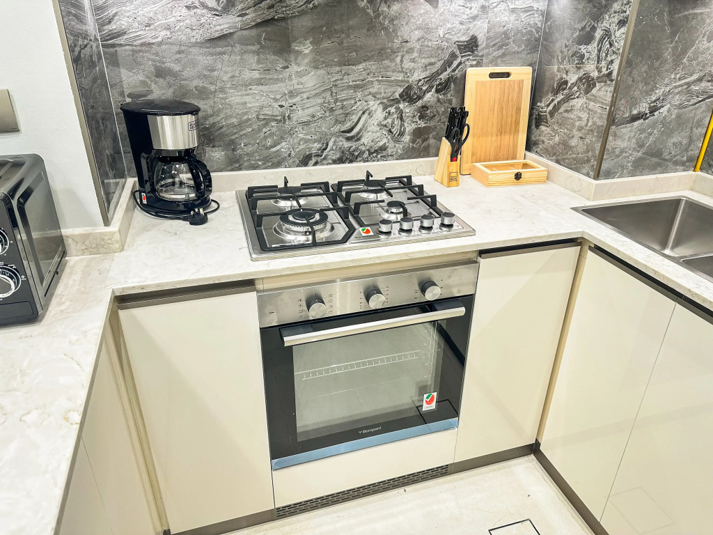 Апартаменты Vserve 1 BR Luxury Escape in Business Bay