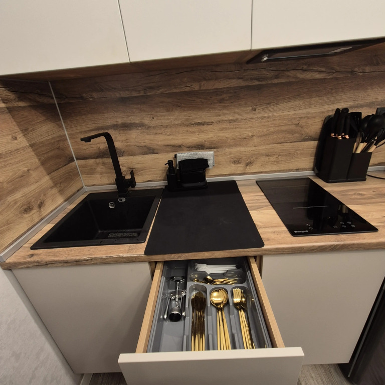 V Novom Dome Flat