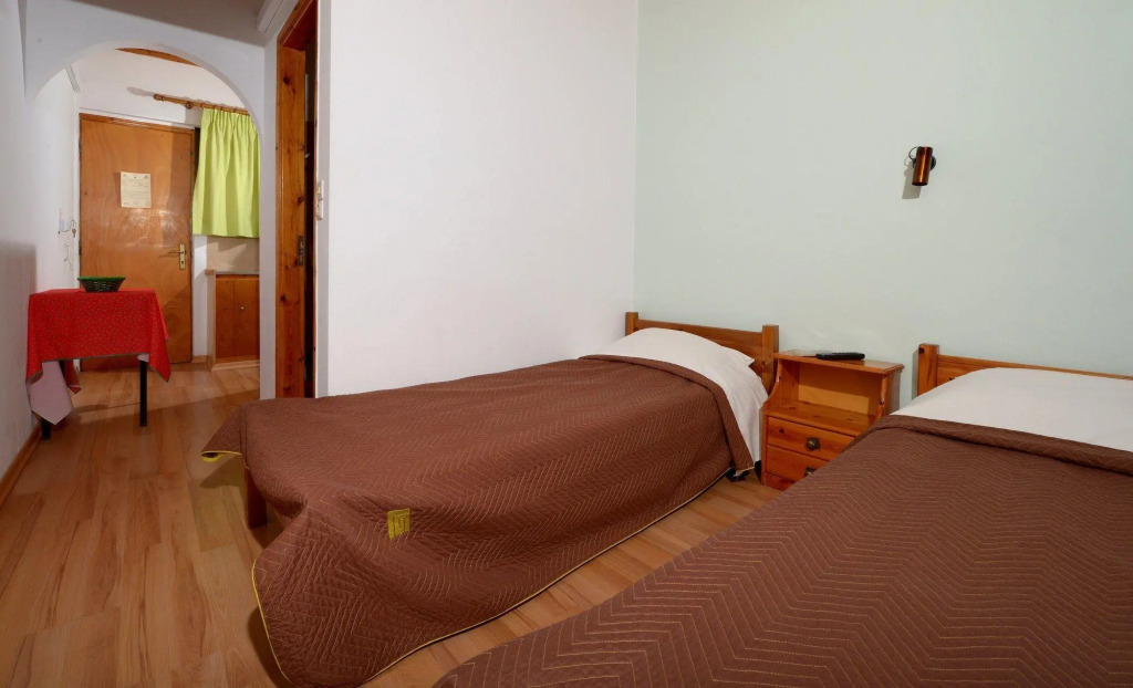 Отель Pharos Rooms