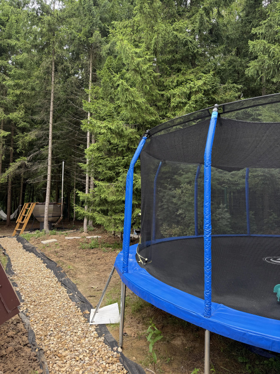 Частный дом Дом A-frame в лесу с чаном и батутом Bearlogo