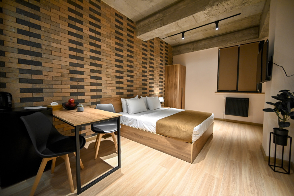 Отель Rooms Apart Hotel by RED