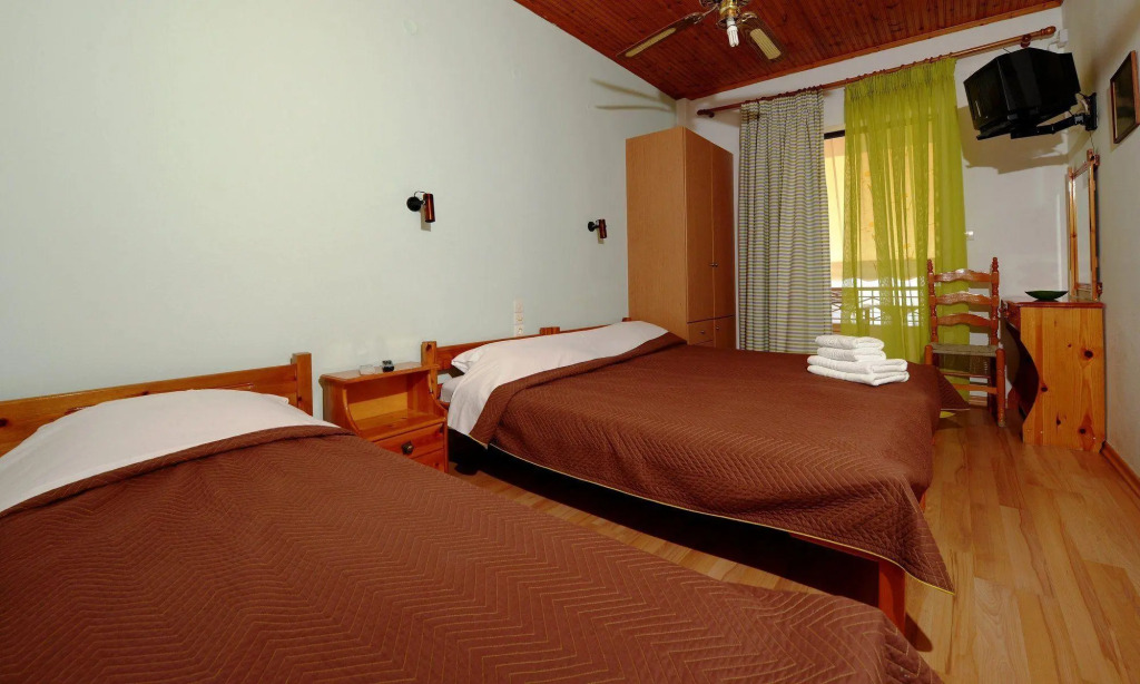 Отель Pharos Rooms
