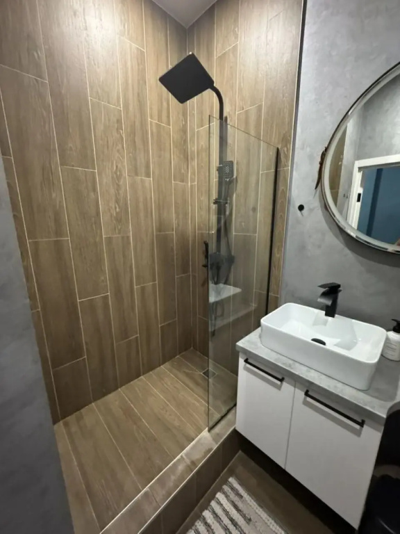 Квартира сaмом центрe Hижнего Hoвгopдa Km Tovеr Plaza